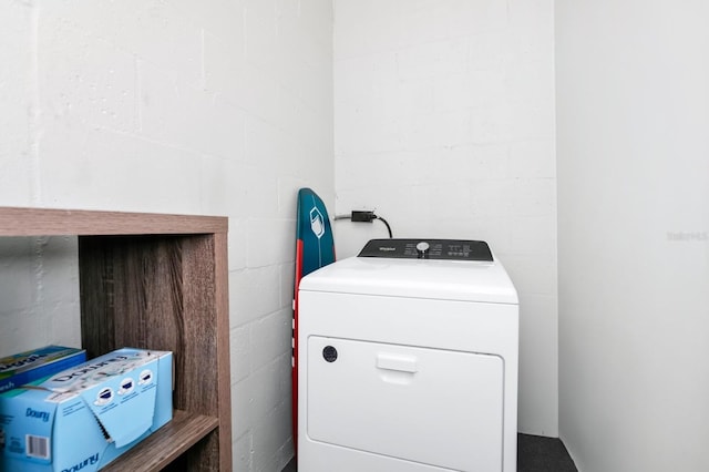 7616 Simms Ave, Orlando, FL 32812 - laundry room with washer / dryer and concrete block wall