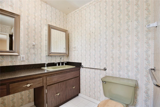 4802 Anton Ave, Apopka, FL 32712 - bathroom with tile patterned floors, vanity, toilet, and baseboards
