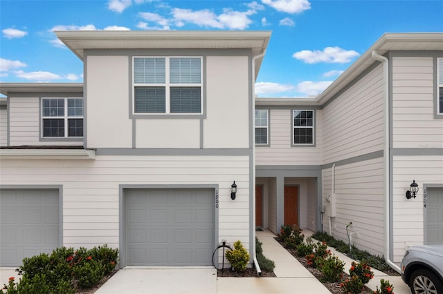 1900 Erudite Way, Winter Park, FL 32792 - view of property with a garage and driveway