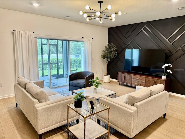1900 Erudite Way, Winter Park, FL 32792 - living area featuring wood finished floors, a chandelier, and baseboards