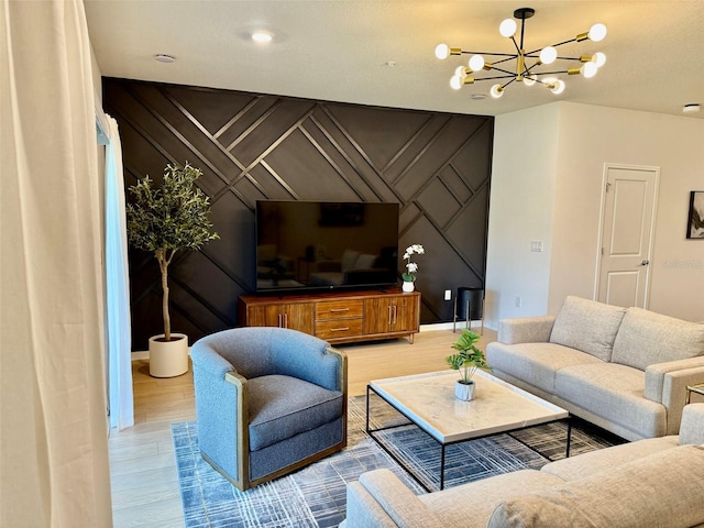1900 Erudite Way, Winter Park, FL 32792 - living area featuring a chandelier, wood finished floors, baseboards, and an accent wall