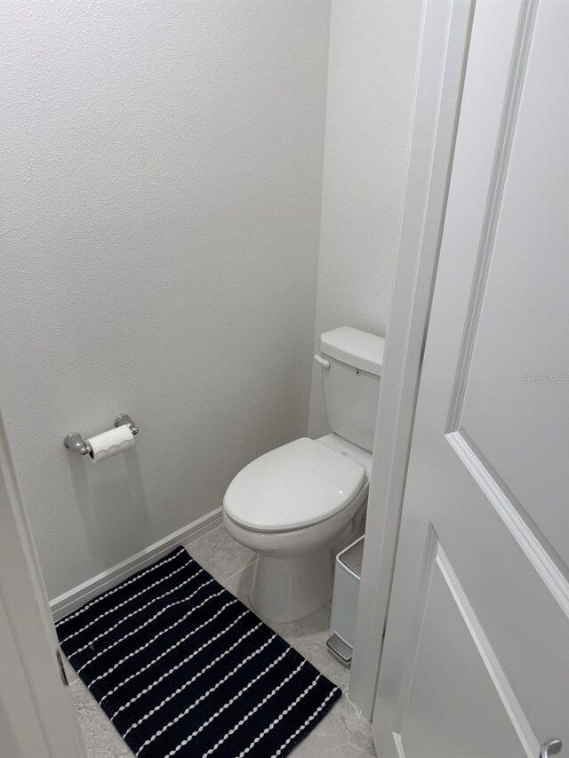 1900 Erudite Way, Winter Park, FL 32792 - bathroom featuring toilet and baseboards