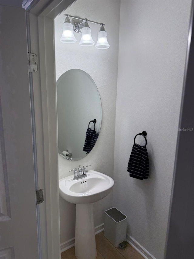 1900 Erudite Way, Winter Park, FL 32792 - bathroom with baseboards, tile patterned flooring, and a sink