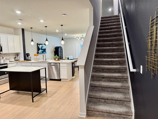 1900 Erudite Way, Winter Park, FL 32792 - stairs featuring wood finished floors and recessed lighting