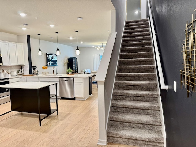 1900 Erudite Way, Winter Park, FL 32792 - staircase with wood finished floors and recessed lighting
