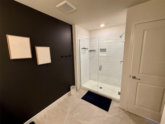 1900 Erudite Way, Winter Park, FL 32792 - bathroom featuring a stall shower, baseboards, and recessed lighting