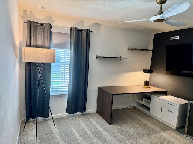 1900 Erudite Way, Winter Park, FL 32792 - unfurnished office featuring light carpet, ceiling fan, baseboards, and a textured ceiling