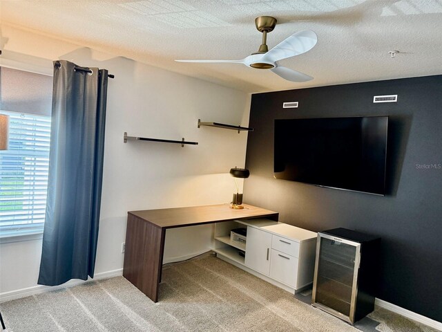 1900 Erudite Way, Winter Park, FL 32792 - unfurnished office featuring light carpet, a ceiling fan, baseboards, and a textured ceiling
