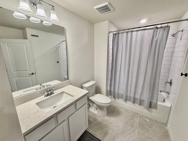 1900 Erudite Way, Winter Park, FL 32792 - bathroom with shower / bath combo, vanity, toilet, and a textured ceiling