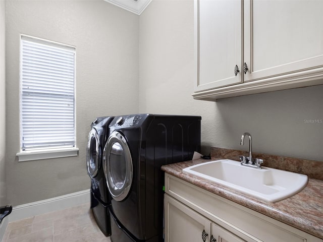 1417 Terralago Pl, Oviedo, FL 32765 - laundry area featuring cabinet space, separate washer and dryer, crown molding, and baseboards