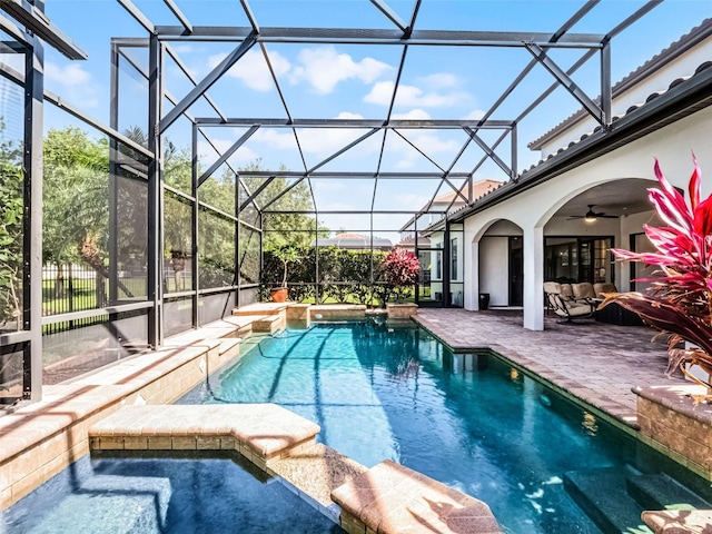 1417 Terralago Pl, Oviedo, FL 32765 - view of swimming pool with a patio area, a pool with connected hot tub, ceiling fan, and a lanai