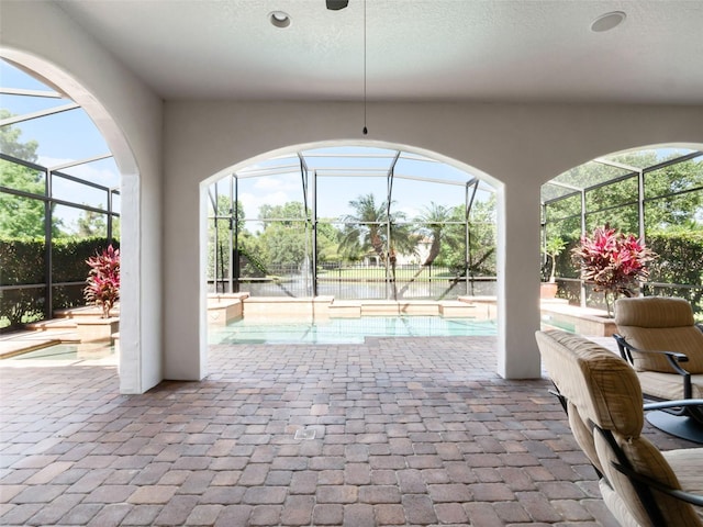 1417 Terralago Pl, Oviedo, FL 32765 - view of patio featuring glass enclosure and a water view
