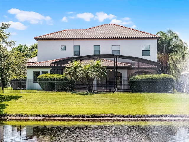 1417 Terralago Pl, Oviedo, FL 32765 - rear view of property with a tiled roof, a water view, stucco siding, and glass enclosure