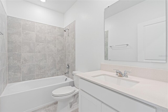 2716 Pierr St, Davenport, FL 33837 - full bath featuring toilet, vanity, tub / shower combination, and tile patterned floors