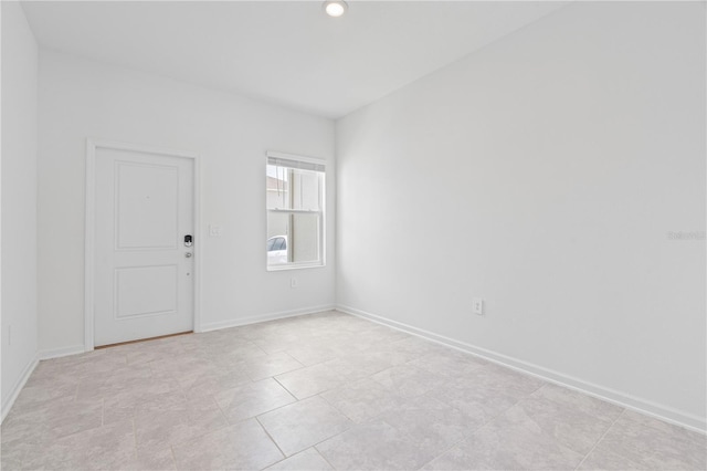 2716 Pierr St, Davenport, FL 33837 - unfurnished room featuring baseboards and light tile patterned floors