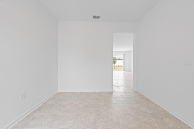 2716 Pierr St, Davenport, FL 33837 - spare room featuring baseboards