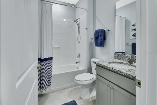 1580 Delphi Way, New Smyrna Beach, FL 32168 - full bathroom featuring vanity, shower / tub combo with curtain, toilet, and tile patterned floors
