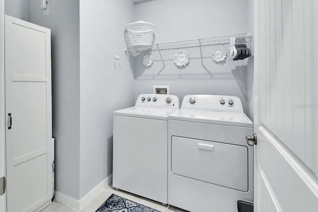 1580 Delphi Way, New Smyrna Beach, FL 32168 - laundry room with independent washer and dryer and baseboards