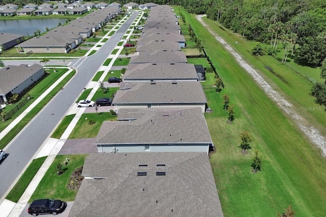 1580 Delphi Way, New Smyrna Beach, FL 32168 - aerial view of property and surrounding area featuring nearby suburban area and a large body of water