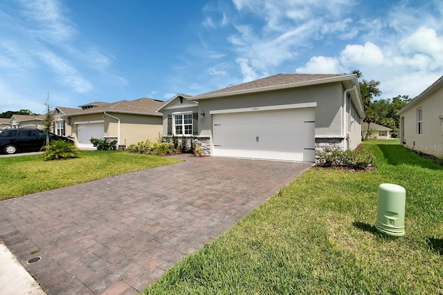 1580 Delphi Way, New Smyrna Beach, FL 32168 - ranch-style house with a garage, stucco siding, decorative driveway, and a front lawn