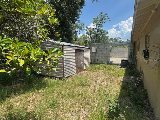 625 E Jackson Ave, Mount Dora, FL 32757 - view of yard featuring central air condition unit