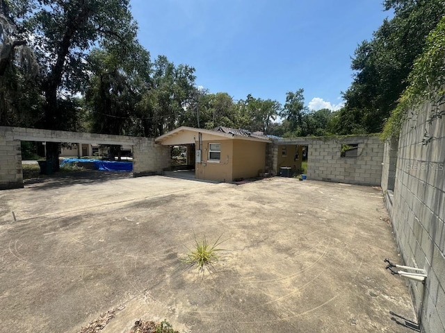 625 E Jackson Ave, Mount Dora, FL 32757 - exterior space with view of wooded area