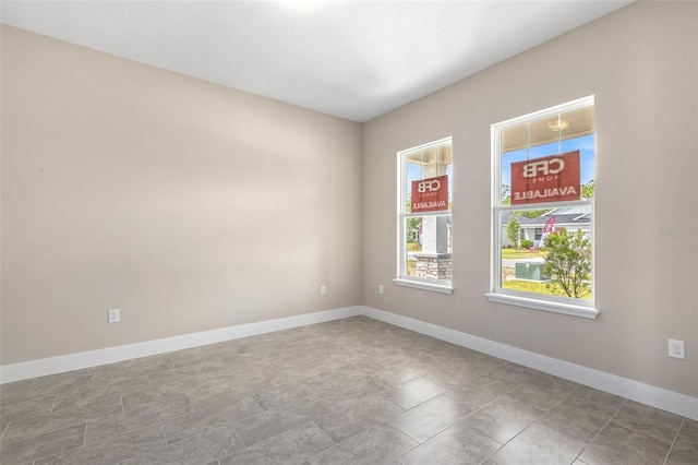 1262 Champions Dr, Daytona Beach, FL 32124 - empty room with baseboards