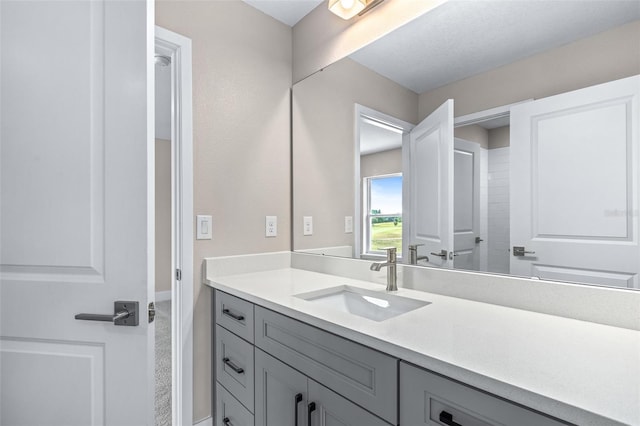 1262 Champions Dr, Daytona Beach, FL 32124 - bathroom with vanity and baseboards