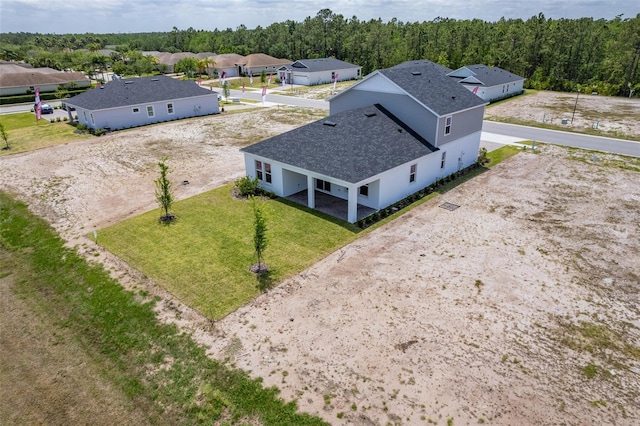 1262 Champions Dr, Daytona Beach, FL 32124 - aerial perspective of suburban area with a forest