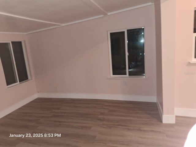 6505 Oelsner St, New Port Richey, FL 34652 - empty room with wood finished floors and baseboards