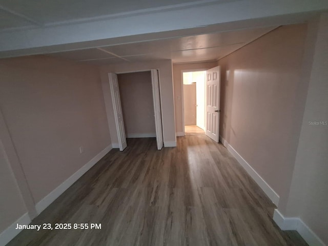 6505 Oelsner St, New Port Richey, FL 34652 - corridor featuring wood finished floors and baseboards