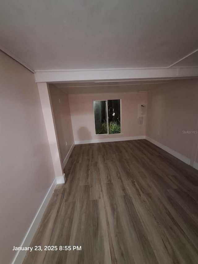 6505 Oelsner St, New Port Richey, FL 34652 - empty room with wood finished floors and baseboards
