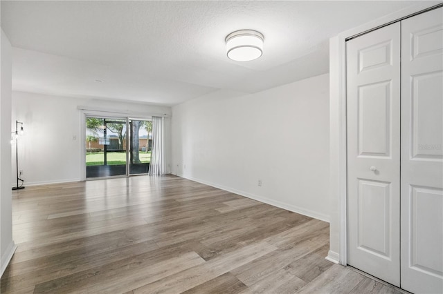 4952 Tangerine Ave Unit 4952, Winter Park, FL 32792 - spare room with light wood finished floors and baseboards