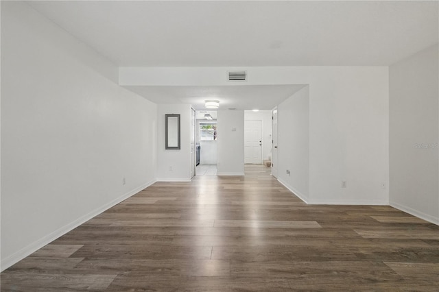 4952 Tangerine Ave Unit 4952, Winter Park, FL 32792 - spare room with dark wood finished floors and baseboards