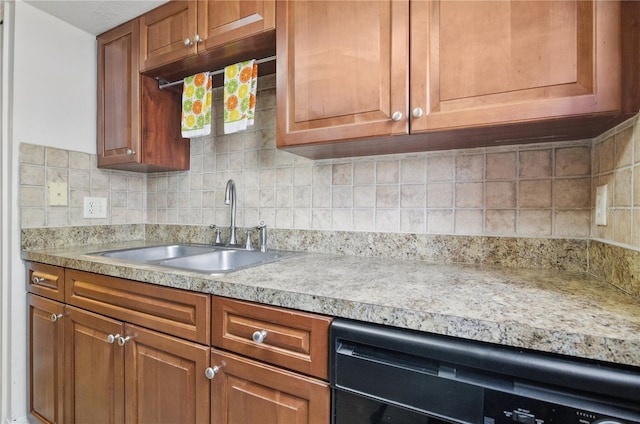 4952 Tangerine Ave Unit 4952, Winter Park, FL 32792 - kitchen with a sink, light countertops, black dishwasher, brown cabinetry, and backsplash