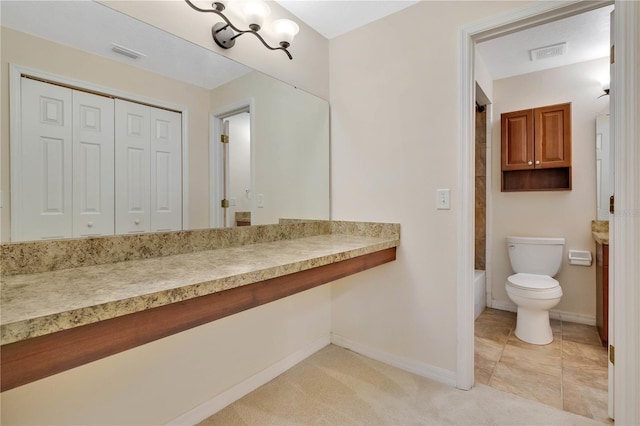 4952 Tangerine Ave Unit 4952, Winter Park, FL 32792 - bathroom featuring toilet, baseboards, vanity, and bathtub / shower combination