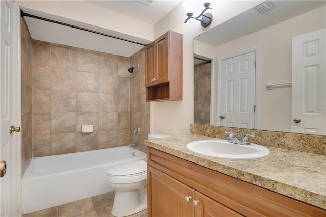 4952 Tangerine Ave Unit 4952, Winter Park, FL 32792 - bathroom featuring vanity, toilet, shower / tub combination, and tile patterned floors