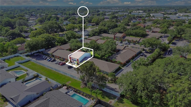 4952 Tangerine Ave Unit 4952, Winter Park, FL 32792 - aerial perspective of suburban area featuring property parcel outlined and a pool area
