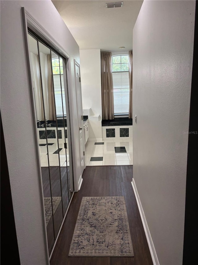 1445 Valley Pine Cir, Apopka, FL 32712 - hall with baseboards and wood finished floors
