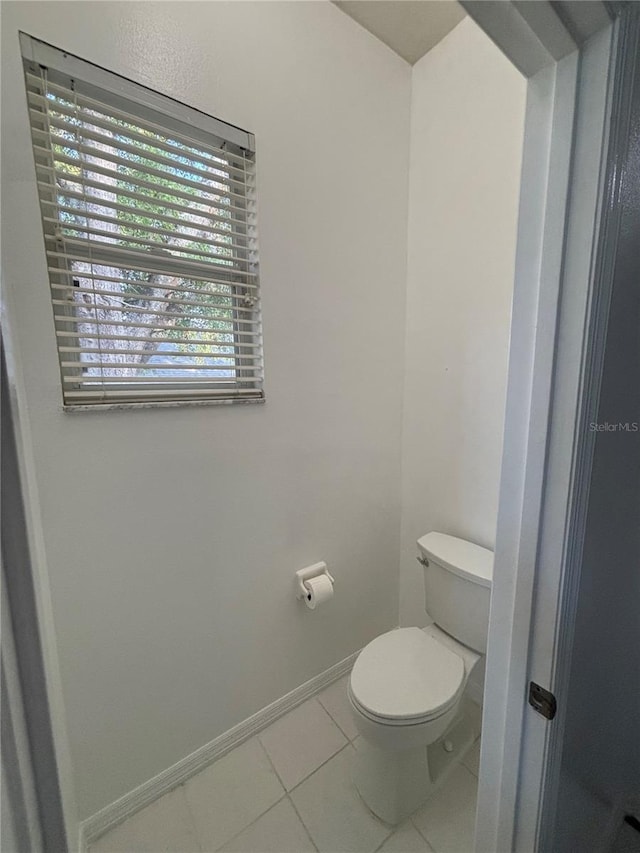 1445 Valley Pine Cir, Apopka, FL 32712 - bathroom featuring toilet, tile patterned floors, and baseboards