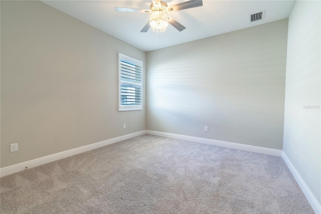4861 Antrim Dr, Sarasota, FL 34240 - carpeted empty room with baseboards and a ceiling fan