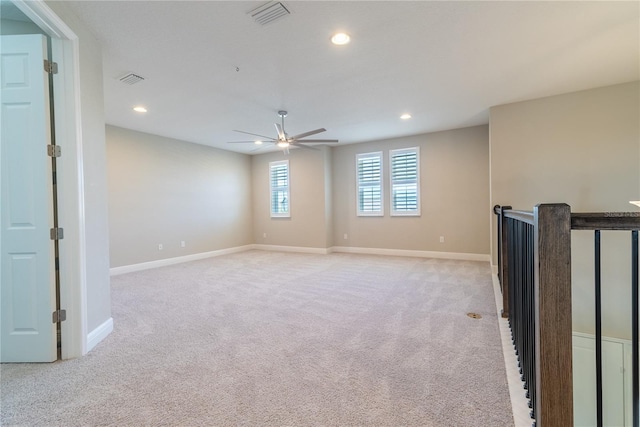 4861 Antrim Dr, Sarasota, FL 34240 - empty room featuring light carpet, recessed lighting, and ceiling fan