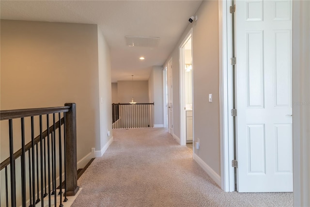 4861 Antrim Dr, Sarasota, FL 34240 - hallway with an upstairs landing, light colored carpet, and recessed lighting