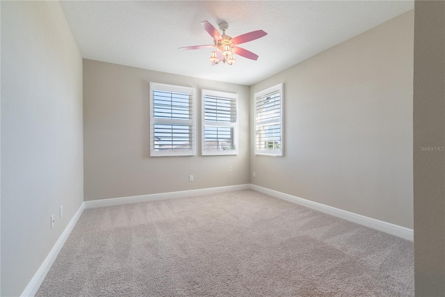 4861 Antrim Dr, Sarasota, FL 34240 - carpeted spare room with ceiling fan and baseboards
