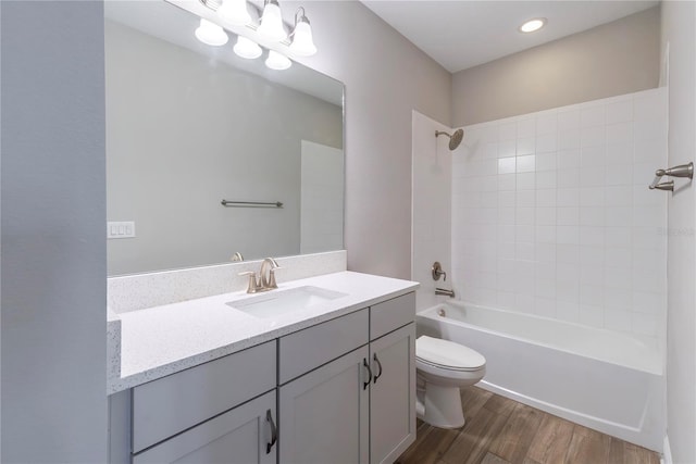 4861 Antrim Dr, Sarasota, FL 34240 - bathroom with wood finished floors, vanity, and shower / washtub combination