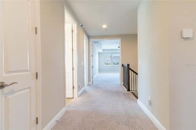 4861 Antrim Dr, Sarasota, FL 34240 - hall with an upstairs landing, light carpet, and recessed lighting