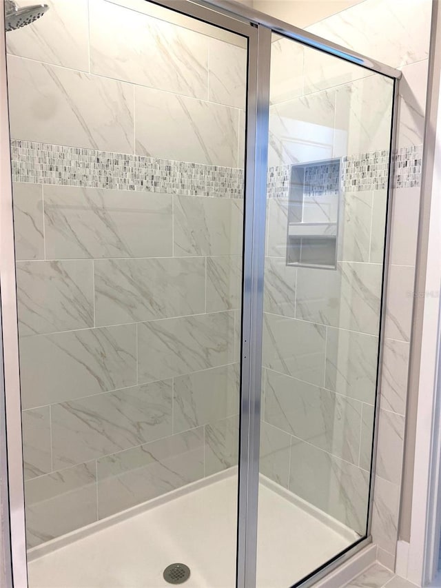 16454 Silver Brook Way, Winter Garden, FL 34787 - bathroom featuring a shower stall