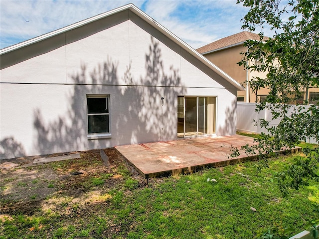 879 Nonastone Run, Casselberry, FL 32707 - back of property with a patio area and stucco siding