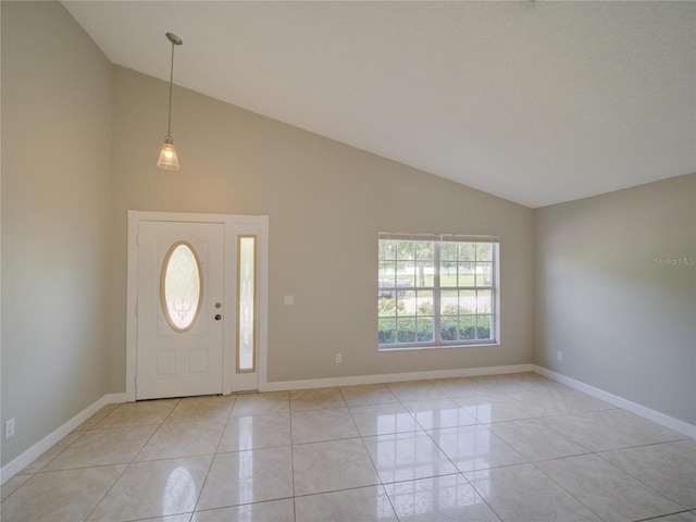 879 Nonastone Run, Casselberry, FL 32707 - entrance foyer with high vaulted ceiling, baseboards, and light tile patterned floors