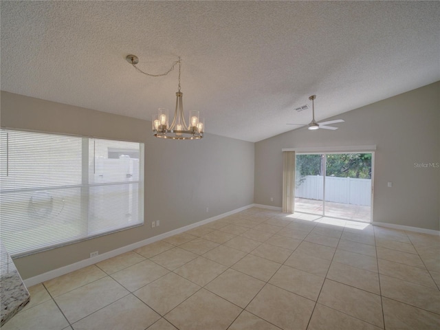 879 Nonastone Run, Casselberry, FL 32707 - unfurnished room with ceiling fan, a chandelier, a textured ceiling, light tile patterned floors, and vaulted ceiling